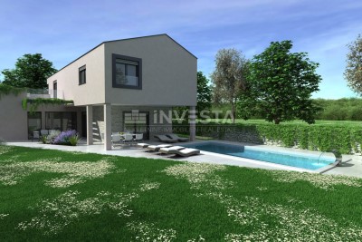 Istria, tranquillità e privacy – terreno edificabile con permesso, pronto per iniziare la costruzione