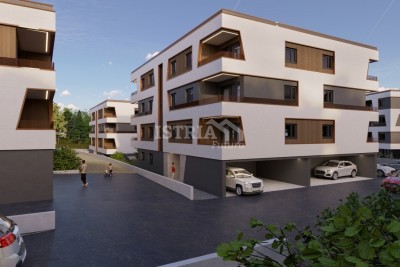 Beautiful apartment on the ground floor of an exceptional new building just 800 m from the sea