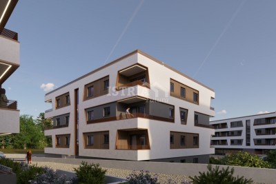 A wonderful apartment on the 1st floor of an exceptional new building only 800 m from the sea