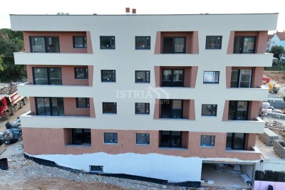 A wonderful apartment on the 3rd floor of an exceptional new building only 800 m from the sea