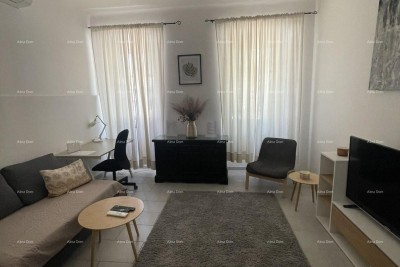 Opremljen stan 45 m2 v pritličju v središču Pule