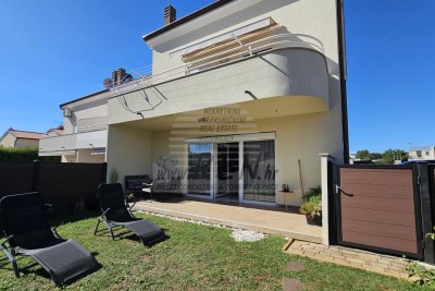 Reihenendhaus mit zwei Wohnbereichen und Garten