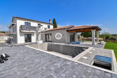 Mediterranean stone villa with panoramic views and a spacious courtyard