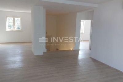Wohnung im 1. Stock mit Garten