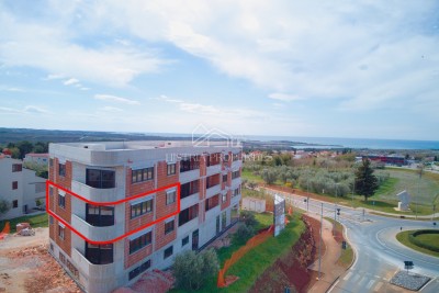 Appartamento con vista mare in un nuovo edificio moderno a 1 km dalla spiaggia.