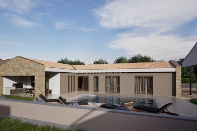 Una casa a un piano dal design moderno con piscina e servizi ausiliari