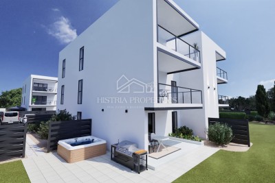 Pratico appartamento con giardino a 800 metri dal mare in un moderno edificio di nuova costruzione