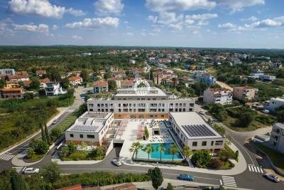 PRILIKA!!! Garsonjera sa garažom na top lokaciji u luksuznom resortu - u izgradnji