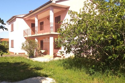 Bale, two-story house with a spacious yard