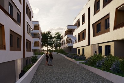 Beautiful apartment on the ground floor of an exceptional new building just 800 m from the sea