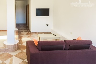 Stanovanje v centru turističnega mesta 82 m2, z manjšim vrtom